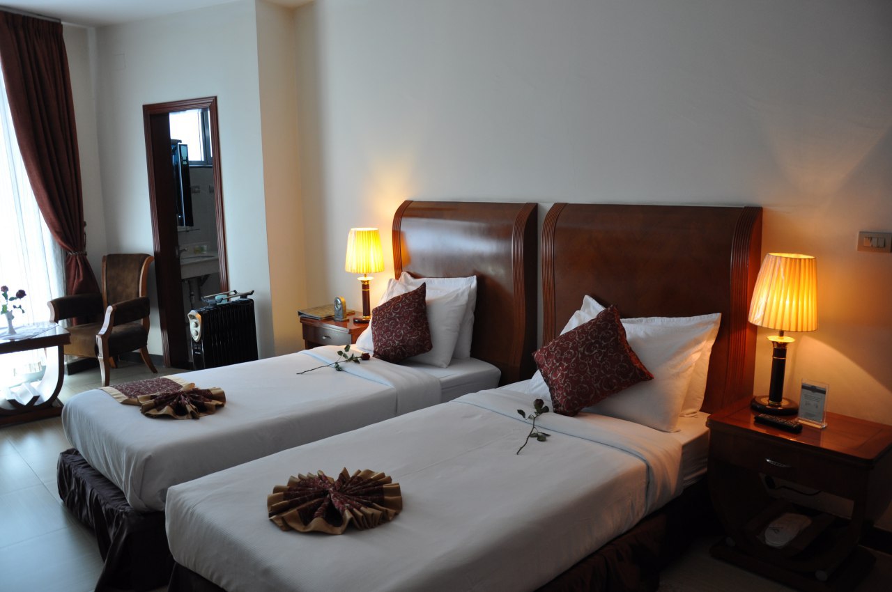 Twin rooms with the Addis cityscape, the Twin Room features 65 square meter (700 square feet) of luxury  living space.